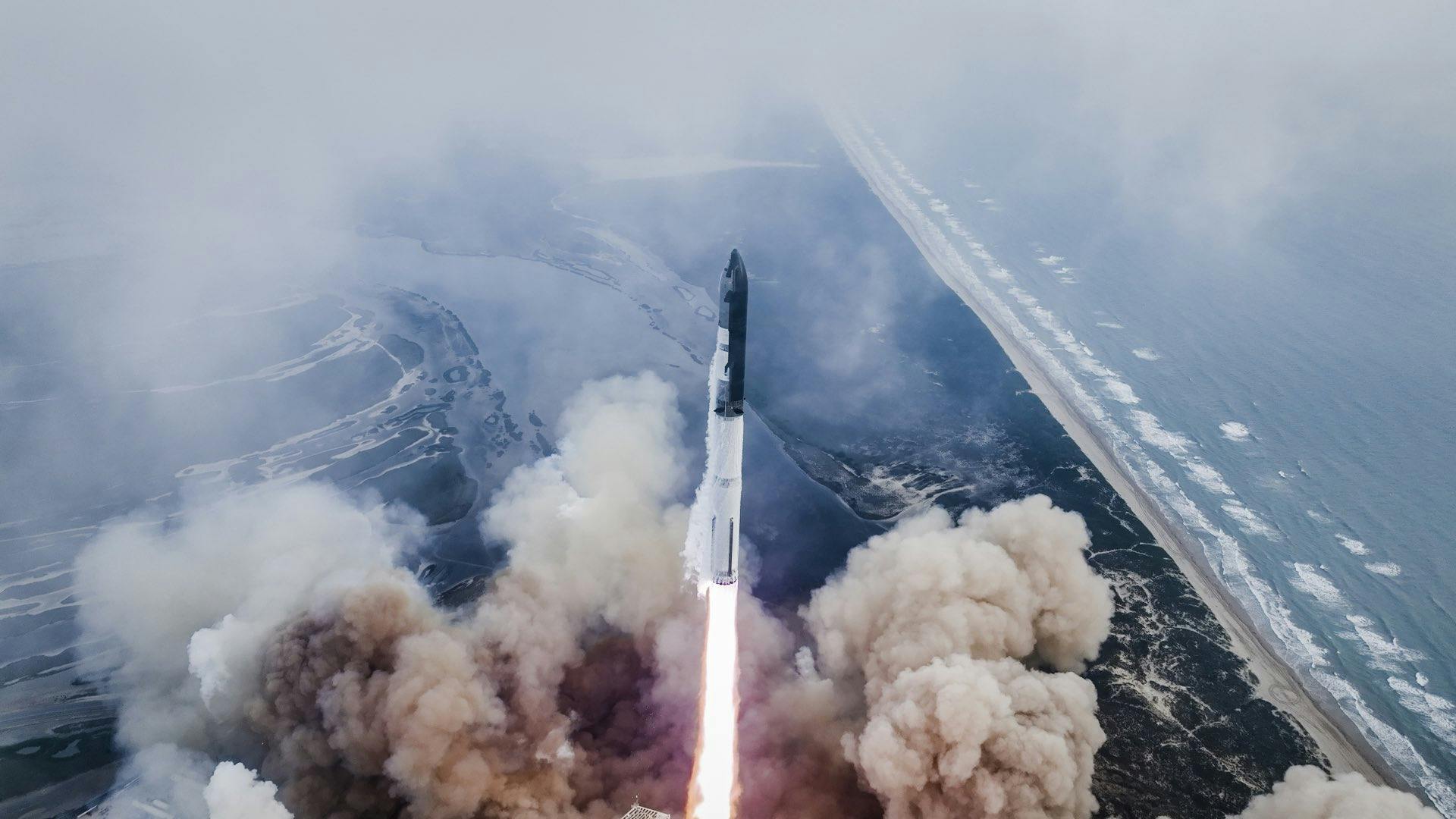 The Starship rocket launching on its third test flight