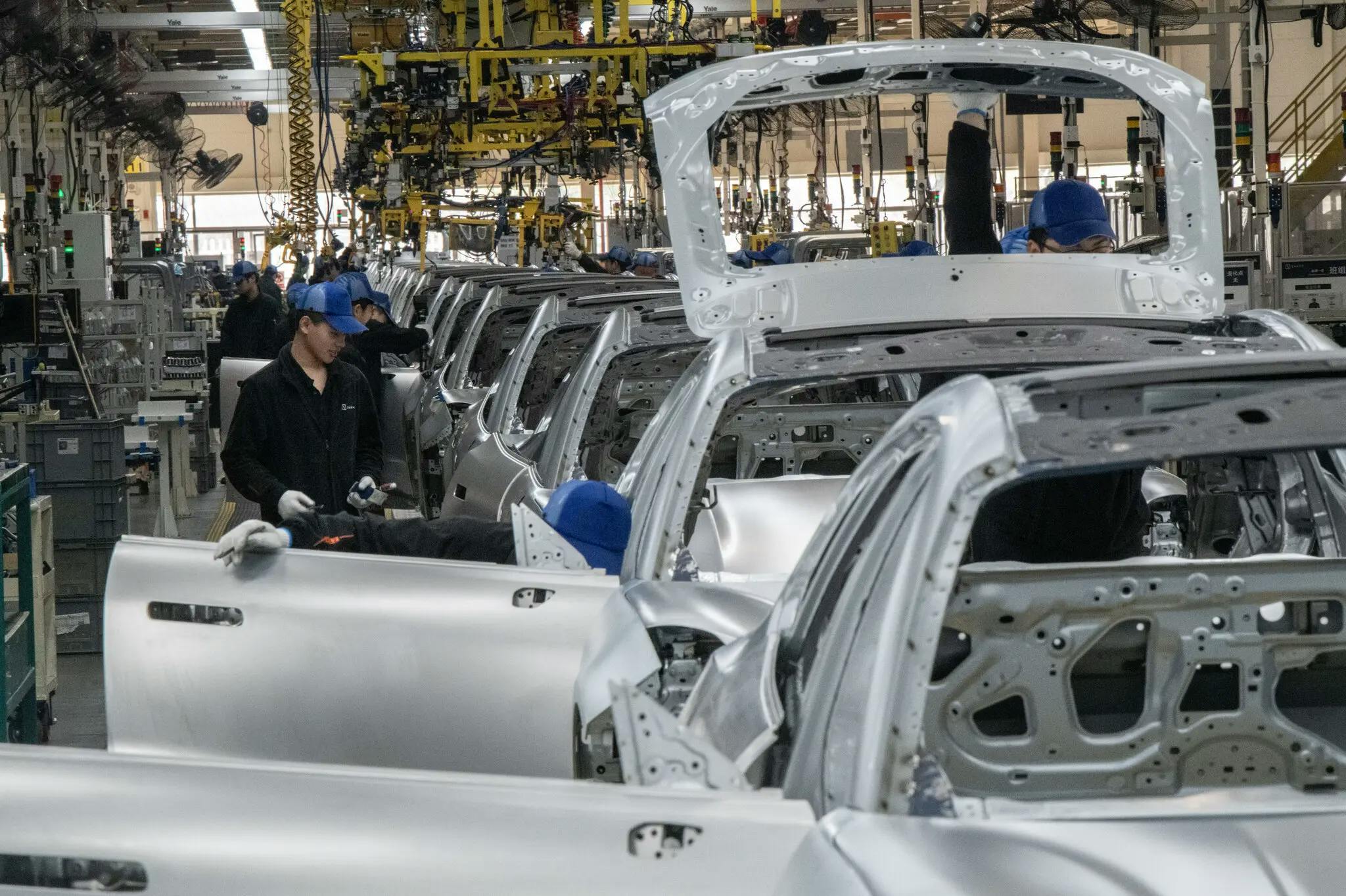 Vehicles on an assembly line