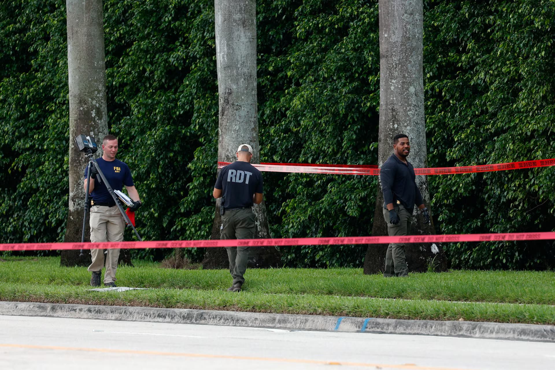 FBI agents investigating around a Trump golf course