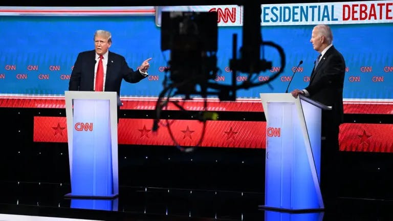 Donald Trump and Joe Biden on the debate stage in Atlanta