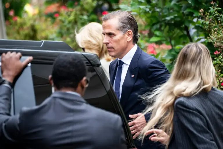 Hunter Biden enters a vehicle