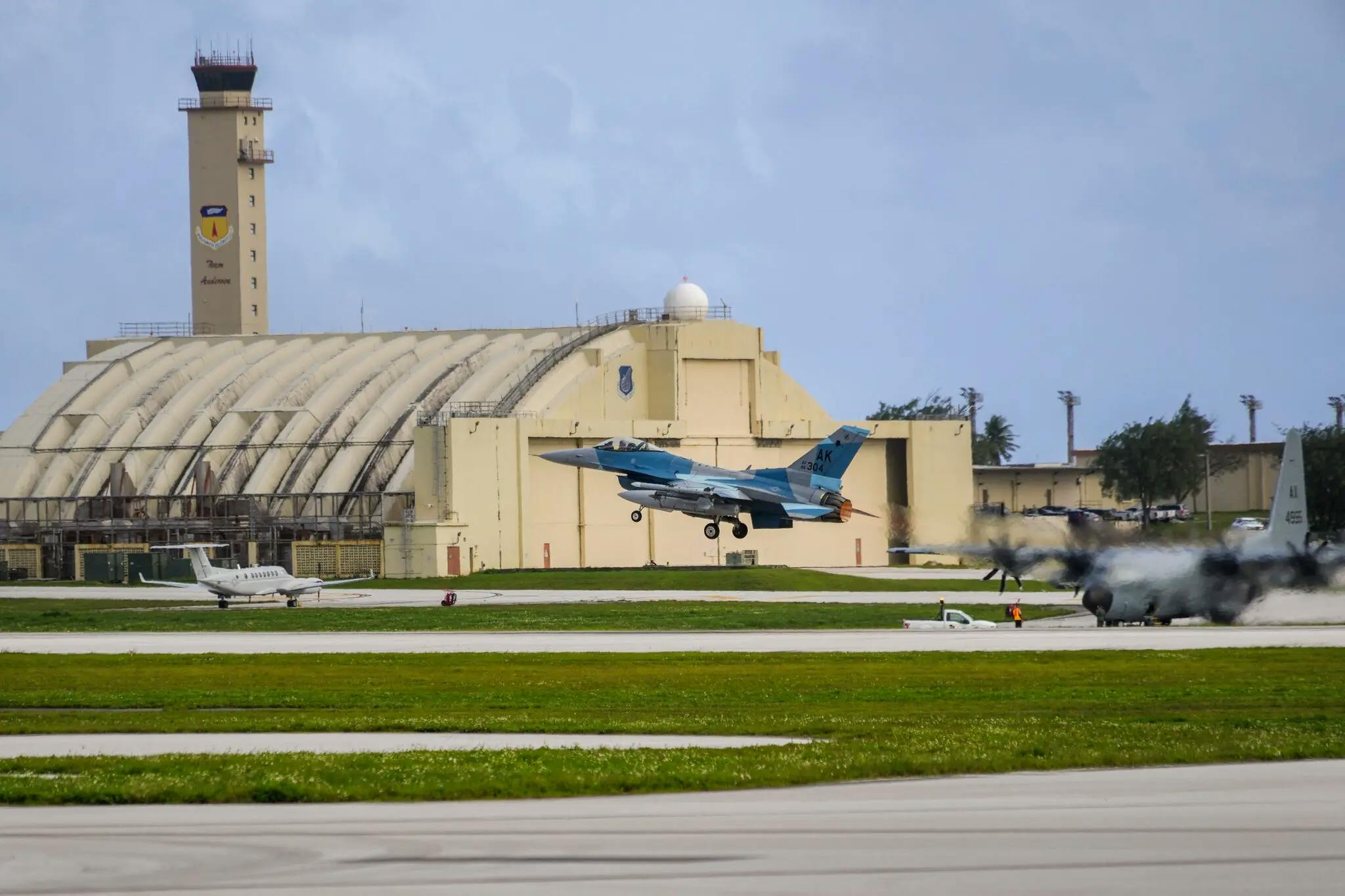 A fighter jet takes off from Guam